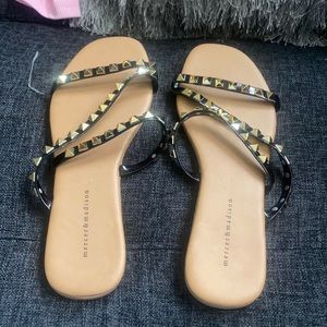 Black slip on sandals